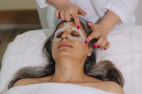 Facial Treatments in Aliso Viejo Woman receiving a beauty treatment.